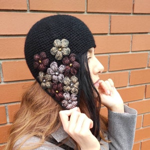 Designer ear warmer hat in black image 1