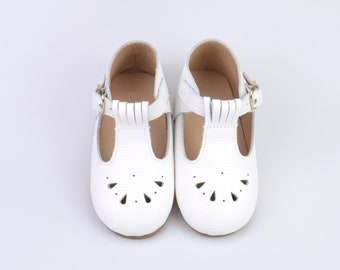 white hard sole baby shoes