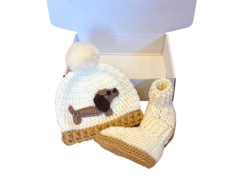 Handmade dog themed baby gift set with sausage dog hat and soft baby booties