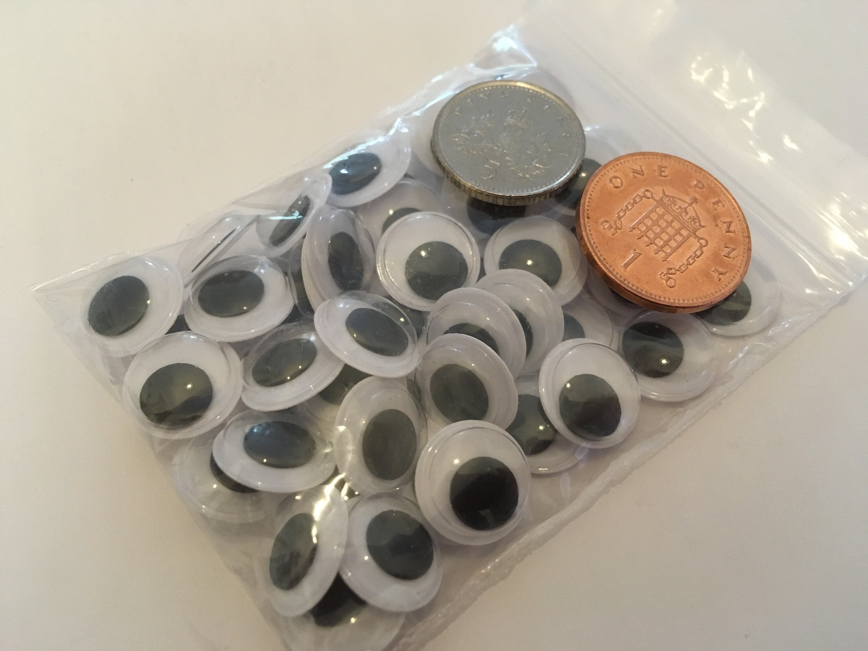 12 - 60 pack, 40mm googly wibbly wiggly wobbly craft eyes, self adhesive