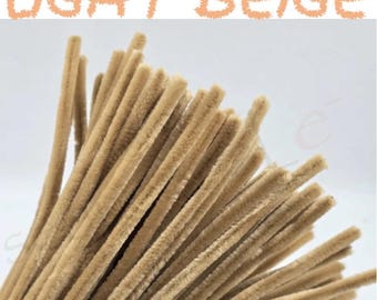 May include: A bundle of light beige pipe cleaners. The image shows a close-up of the fuzzy, flexible craft supplies. The text "LIGHT BEIGE" is displayed above the pipe cleaners in a matching color.