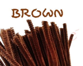 May include: A bunch of brown pipe cleaners. The word "BROWN" is written in brown letters at the top of the image.