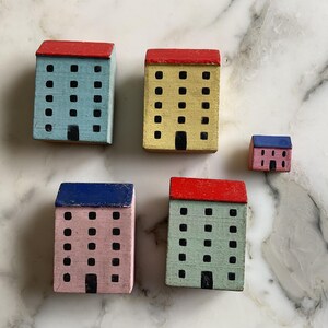 A charming early twentieth century folk art ‘village’ collection of scratch built model houses.