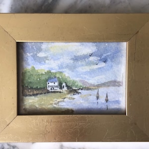 A delightful vintage small watercolour of Dylan Thomas’s Laugharne boathouse.