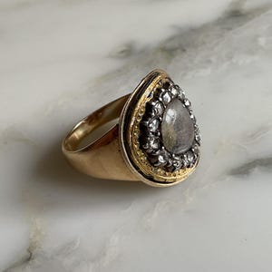 A wonderful Georgian 18 carat gold and diamonds inscribed mourning ring.