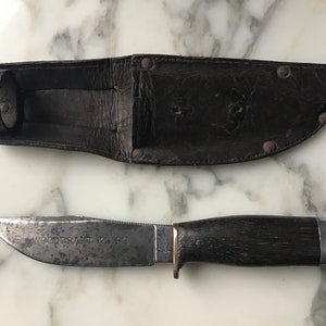 A very good late Victorian Sheffield sheath knife.