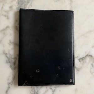 A splendid vintage Cartier calfskin leather folder.