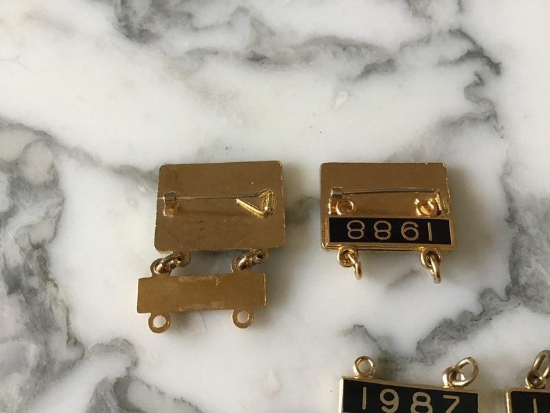 Vintage Isle of Man TT supporters badges.