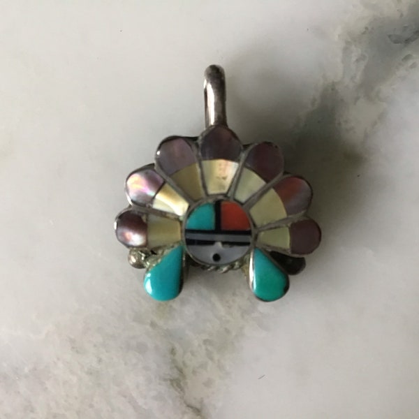 A lovely vintage Native American Zuni signed sterling silver pendant.