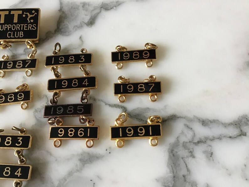 Vintage Isle of Man TT supporters badges.