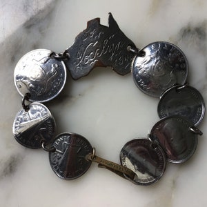 Delightful Australian World War 2 trench art coin bracelet.