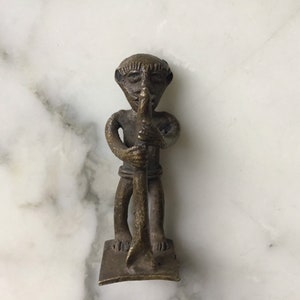 Charming late 19th century Ashanti bronze gold weight.