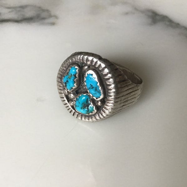 A superb old Native American Navajo sterling silver and turquoise ring.