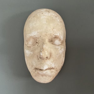 A fantastic if macabre early 19th century plaster cast criminal’s death mask.
