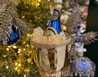 Boule décorative à champagne/mousseux dans un seau à glace