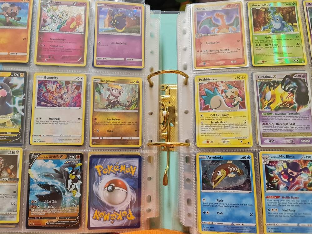 pokemon card folder Amazon.com: TopDeck Mini Binder | Holds 200+ Cards | 4 Pocket Trading Cards  Album | Long Term Storage Binder | Side Load Sleeves | Pokemon/MTG/Yugioh/TCG  Folder main image 0