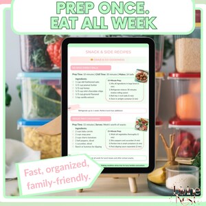 K&ouml;nnte beinhalten: Ein Tablet-Bildschirm zeigt ein Rezept zur Essenszubereitung mit dem Text &bdquo;Einmal vorbereiten. Die ganze Woche essen&ldquo;. Der Bildschirm zeigt Anweisungen f&uuml;r No-Bake-Energieb&auml;llchen und Gem&uuml;se-Vorbereitungsbeh&auml;lter. Der Text &bdquo;Schnell, organisiert, familienfreundlich&ldquo; ist ebenfalls enthalten.