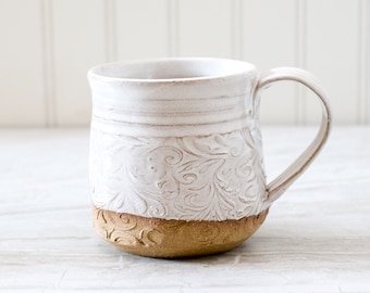 Handmade Stoneware Coffee Mug: Cream Glaze, Leaf Scroll Texture