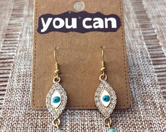 Handmade earrings with small teal faceted gemstones