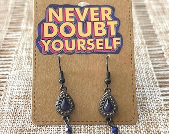 Handmade earrings with small dark blue faceted gemstones