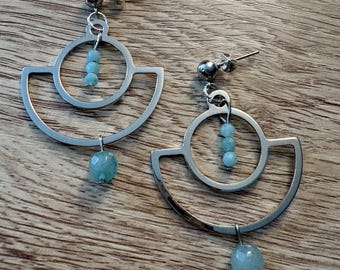 Handmade earrings with silver tone studs and natural aquamarine stones