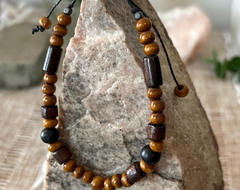 Handmade men’s adjustable beaded bracelet, wood, black and hematite stones, Brazilian cord, ~7-9in wrist—Comes with Stability & Balance card