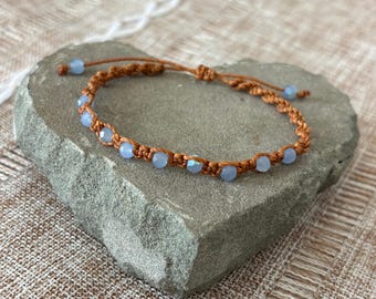 Handmade adjustable slipknot beaded bracelet, faceted light blue beads, Brazilian cord, 6-7in wrist