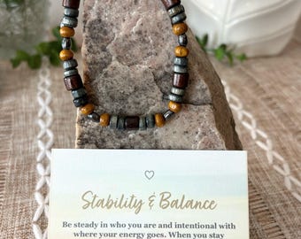 Handmade men’s adjustable beaded bracelet, wood and hematite stones, Brazilian cord, ~7-9in wrist—Comes with Stability & Balance card