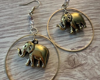 Handmade gold tone elephant hoop earrings with glass beads