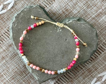 Handmade adjustable slipknot beaded bracelet, gold tone heart beads, faceted pink & opal color beads, Brazilian cord, 6-7in wrist