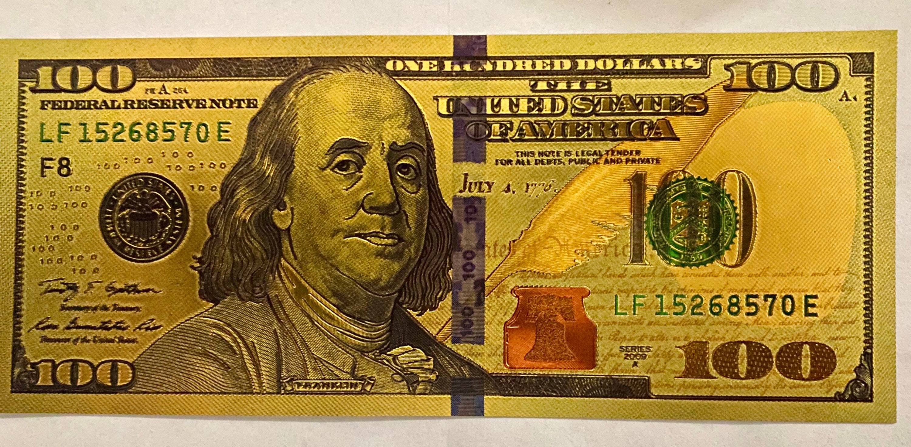Golden 100 Dollar Bill