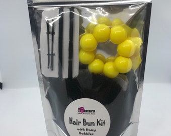 Kit de pain de cheveux avec le bobble jaune de marguerite