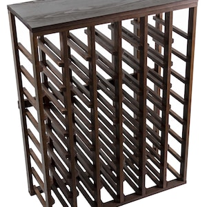 May include: A dark walnut wood wine rack with a table top. The rack holds 48 bottles of wine. Pictured 48 Bottle Table Top. Color: Dark Walnut