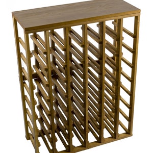 May include: A wooden wine rack with a table top, holding 48 bottles. The rack is made of natural wood with a golden oak finish. Pictured is 48 Bottle Table Top.