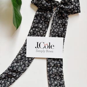 extra large hair bow, long tail clip in bow, long hair bow. Black and white floral hair bow