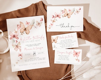 May include: A set of baby shower invitations with a butterfly theme. The invitations are white with pink and brown butterflies and text that reads "A Little Butterfly is on her way". The text also includes the names "Maria & Sergio", the date "August 25, 2022", and the time "2:00 PM".