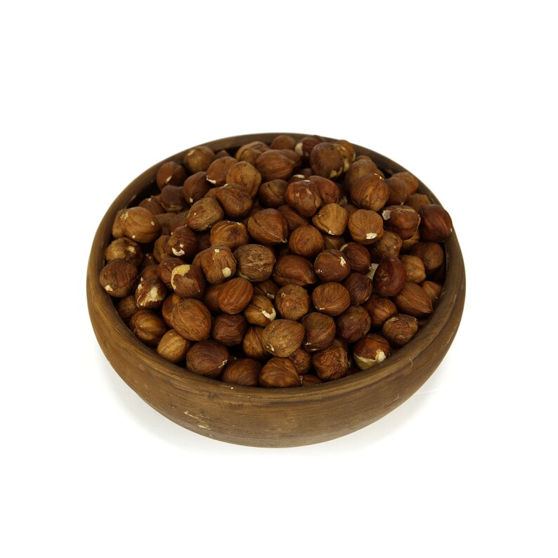 Best Quality GMO-Free. Corylus Avellana Nuts in a paper Bag Raw Shelled Hazelnut