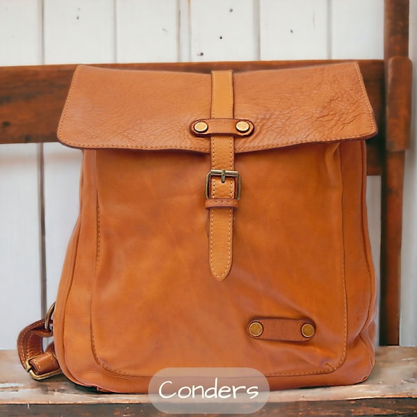 Tan leather backpack in buttery soft Italian washed leather. Vintage tan leather rucksack with grab handle.