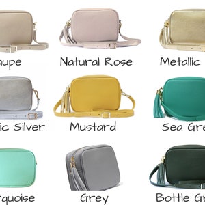 May include: Nine different coloured leather crossbody bags with a tassel. The colours are taupe, natural rose, metallic gold, metallic silver, mustard, sea green, turquoise, grey, and bottle green.