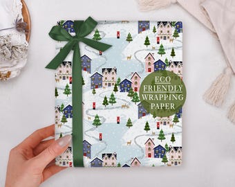 Papier cadeau de Noël à motif village de ski enneigé - Emballage cadeau de luxe, plié