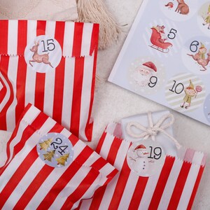 red and white striped bags with numbers on them