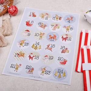 a table with a christmas themed calendar on it