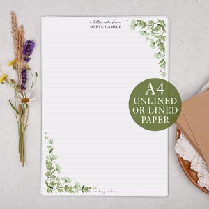 May include: White A4 lined paper with floral corner designs and the text "a little note from MAEVE CAMILE". A green circle states "A4 UNLINED OR LINED PAPER". A bouquet of flowers and brown envelopes are also visible.