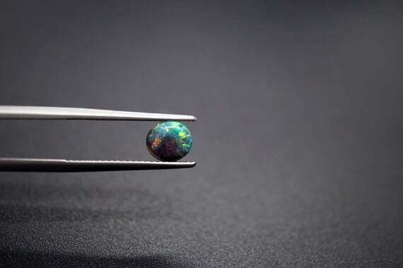 Genuine Multi-colored Boulder Opal Loose Oval Cut 6.5*5.9*3.1mm 0.75ct Rainbown