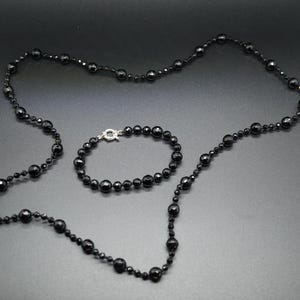 Black Tourmaline Knotted Necklace: Faceted Bead, Sterling Silver Clasp