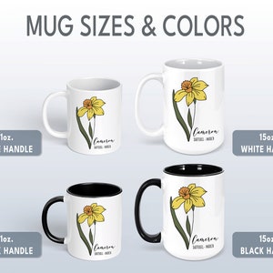 Peut inclure: Quatre tasses en c&eacute;ramique blanche avec des poign&eacute;es noires, deux de 11 oz et deux de 15 oz. Chaque tasse pr&eacute;sente une fleur de jonquille jaune avec des feuilles vertes et le nom "Cameron" avec le texte "Jonquille - Mars".
