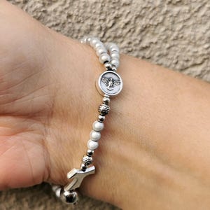 Custom Holy Spirit & Tau rosary bracelet with miracle illusion beads and devotional medal of your choice | AndavyGifts Catholic gifts