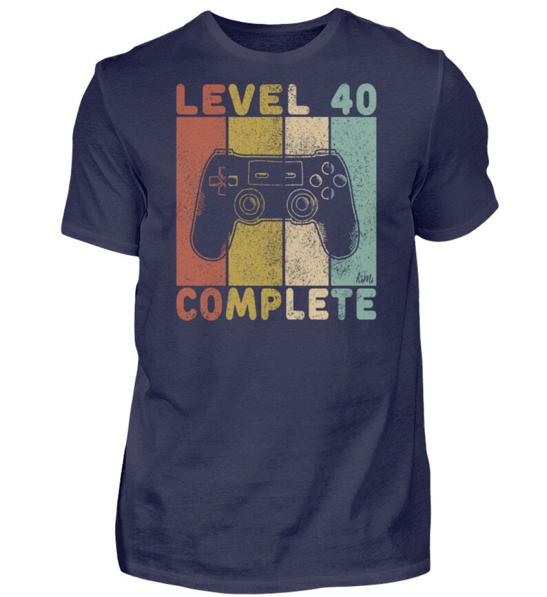May include: A navy blue t-shirt with a vintage-style graphic of a video game controller and the text "Level 40 Complete".