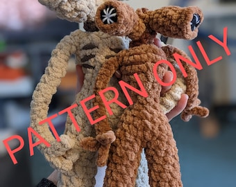 May include: Two crocheted plush toys in the shape of a creature with long arms and legs. One is brown and the other is beige. The toys are held in a person's hand. The text "PATTERN ONLY" is superimposed on the image.
