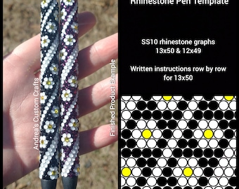 May include: Two rhinestone-covered pens with a daisy swirl design. The pens are black and white with yellow and purple rhinestones. The image includes a template for the design, which is 13x50 and 12x49.